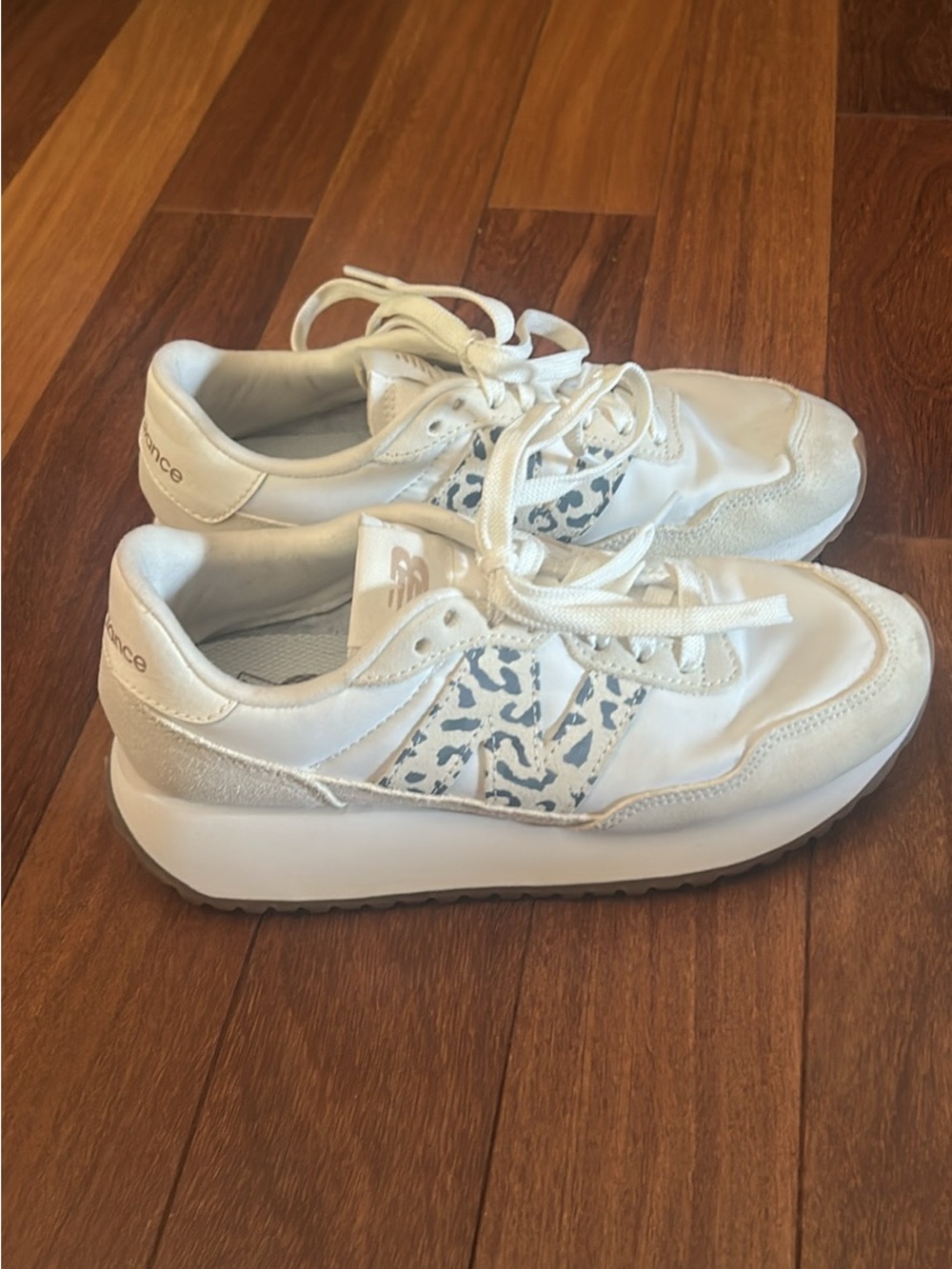 New Balance White Sneakers with Blue Leopard Stripe